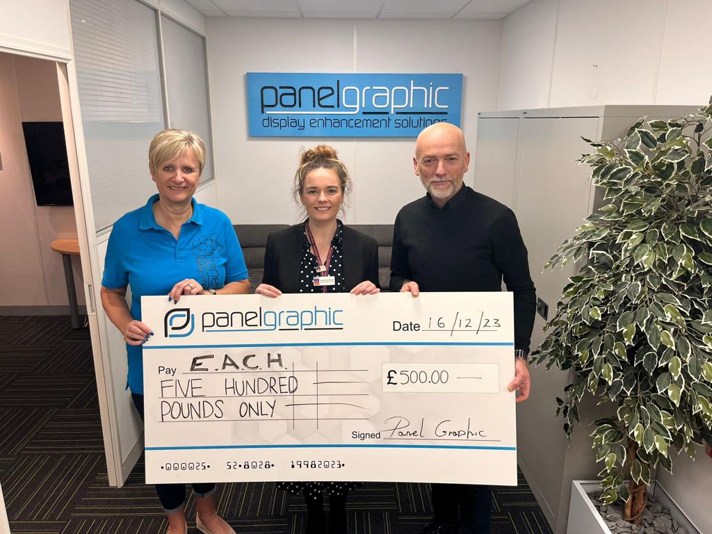 Image of large promotional cheque being help my Managing Director Steve Earl, Company secretary Tracey Earl and Fundraiser Organiser Laura Southcott. Panel Graphic donated £250 to East Anglia's children's hospice 
